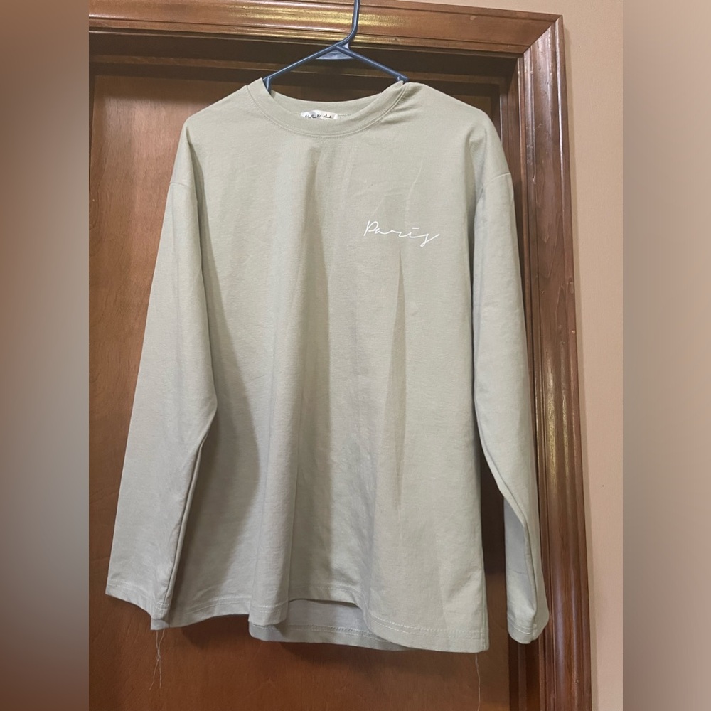 Olive green long sleeve men’s shirt.